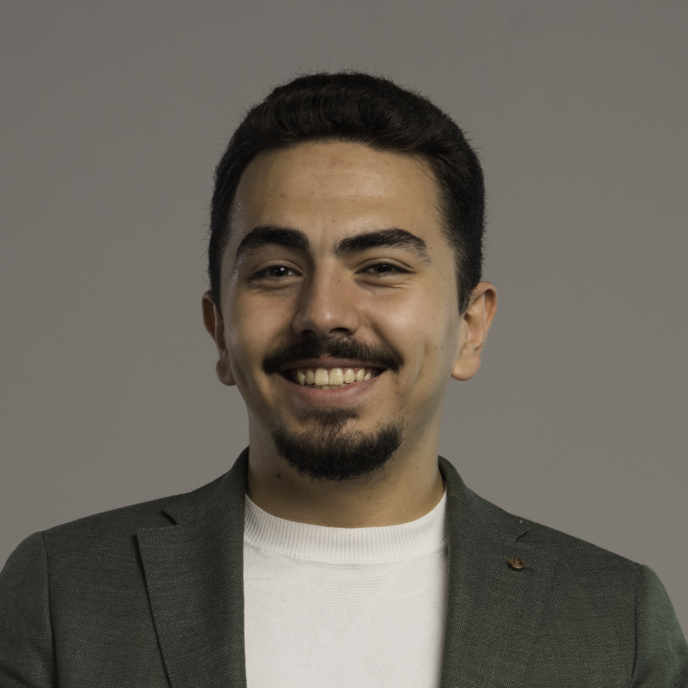 A businessman in dress code introducing something